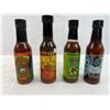 Image 4 : Four mixed unopened bottles of hot sauce