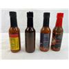 Image 2 : Four mixed unopened bottles of hot sauce