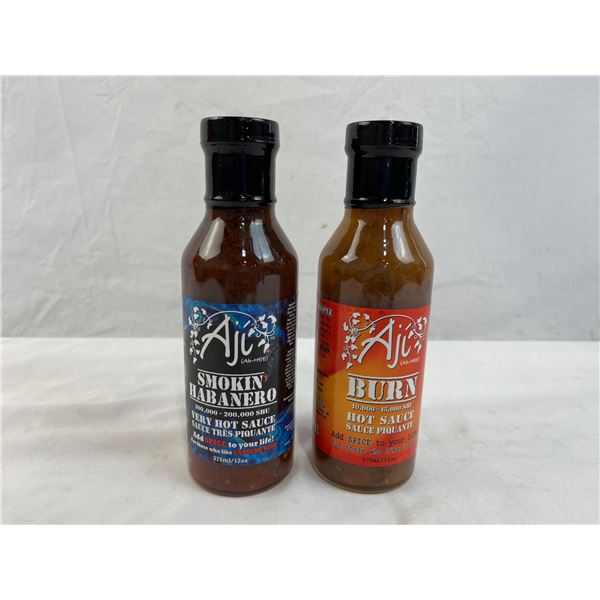 Two bottles of AJI (ah-hee) hot sauce