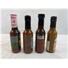 Image 3 : Four mixed unopened bottles of hot sauce
