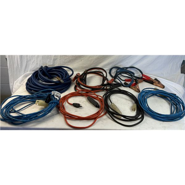 Lot of jumper cables, air hose and electrical cords