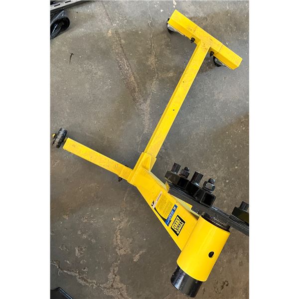 Yellow metal engine block stand