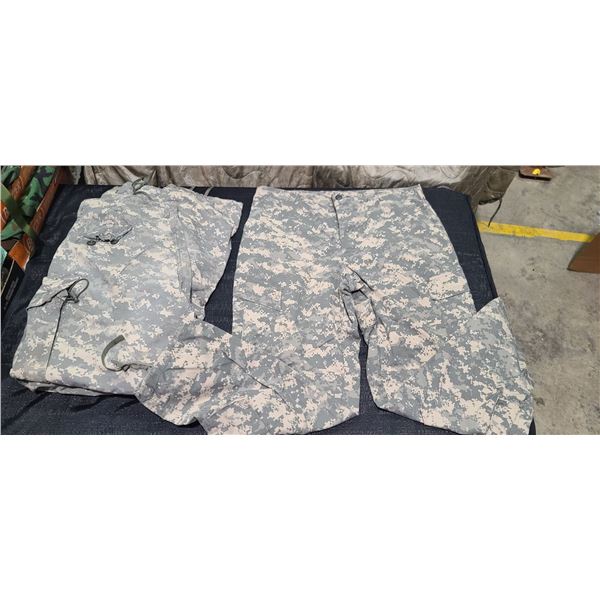 TWO PAIRS OF LARGE-REGULAR DIGITAL ARMY COMBAT CAMOUFLAGE PANTS ONE PAIR HAS SOME WEAR PSI