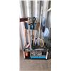 Image 2 : GARDEN IMPLIMENT RACK FULL OF GARDENING TOOLS: AXE, SHOVEL, RAKE, EDGE TRIMMER, BROOM PSI