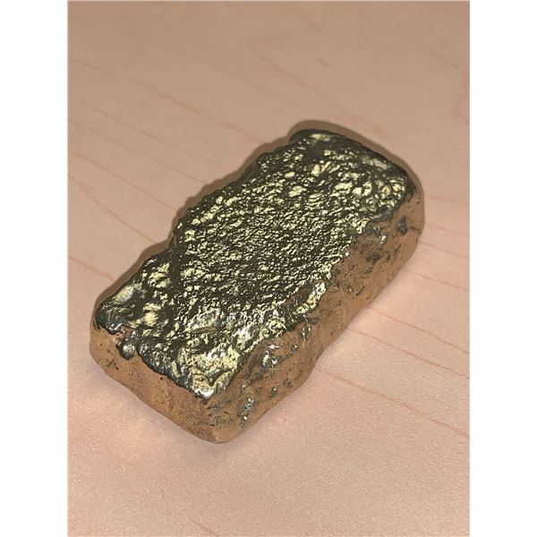 One Hand Poured Ingot made from melted computer pins ( weight 99.7 grams) contents & purity unknown