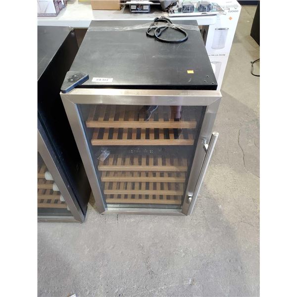 Danby Glass front Wine cooler lights up slow to get cold sold as is