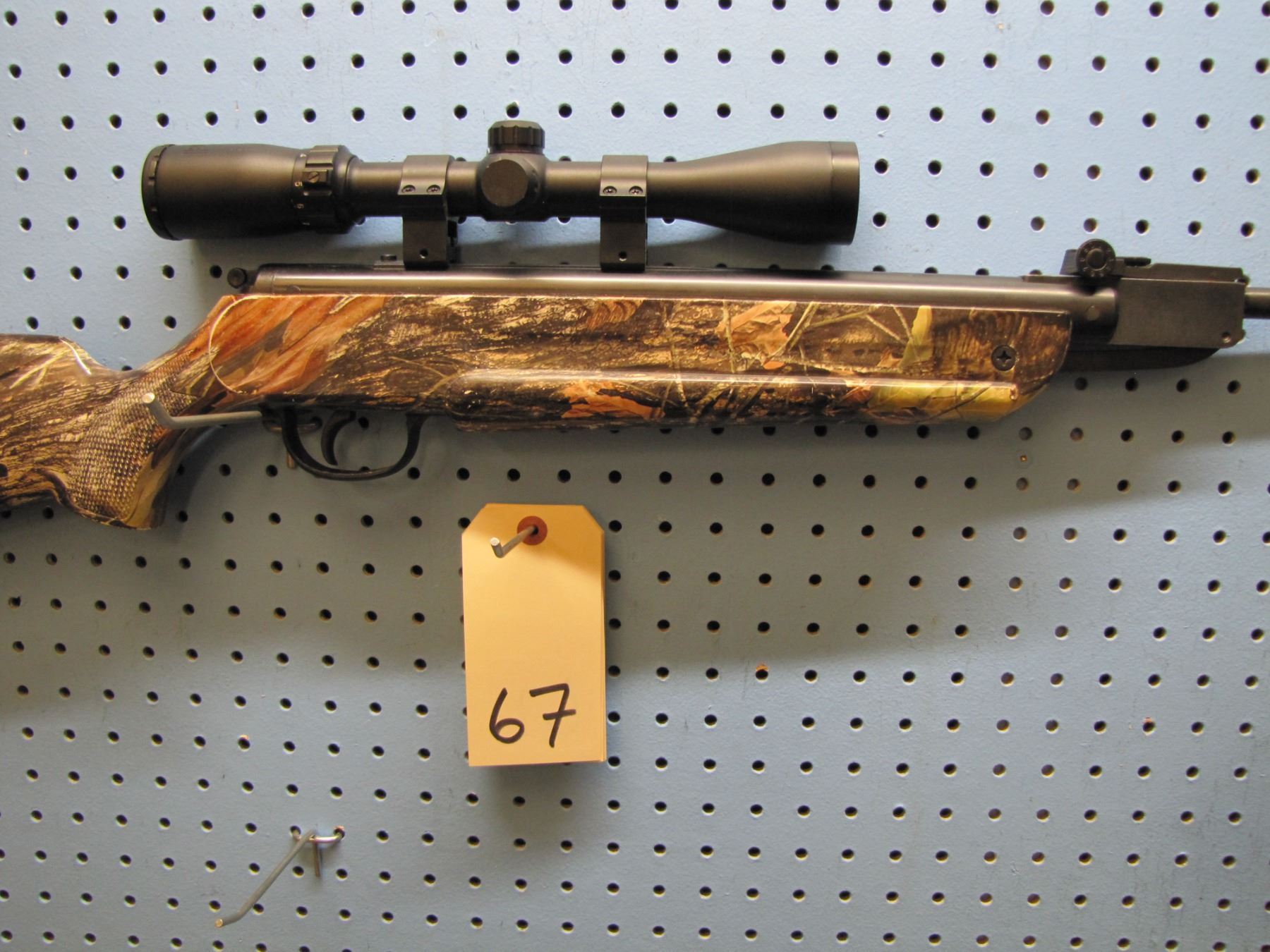 Hatsan; model 70 camo pellet gun; .177 caliber; made in Turkey; 1000 FPS ; Bushnel sportsman scope