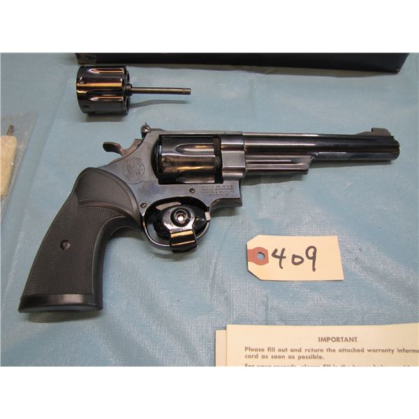 RESTRICTED:  Smith & Wesson model 25 - 2 ; 45 acp in original box, with extra cylinder in 45 LC , fu