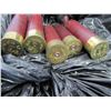 Image 1 : Lot of 12 gauge shotgun shell hulls; in a plastic garbage bag estimate about half a 45 gallon drum s