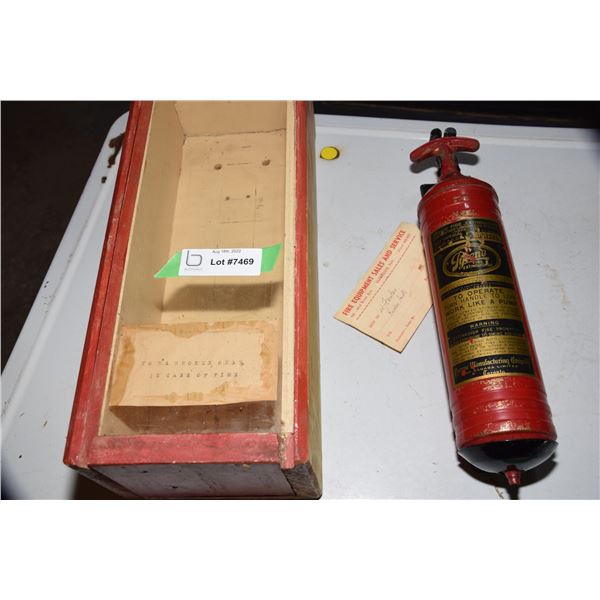 Vintage fire extinguisher in case