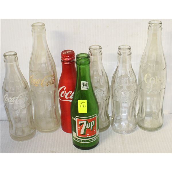 6 COCA COLA GLASS BOTTLES WITH 1 7UP