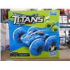 Image 1 : 2 New Titans R/C Stunt Cars - 2.54 GHz