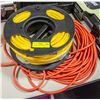 Image 1 : LOT OF 2 EXTENSION CORDS ONE ON REEL