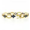Image 3 : Vintage 18k Gold 8.0 ctw Royal Blue Sapphire Cluster Open Marquise Link Bracelet