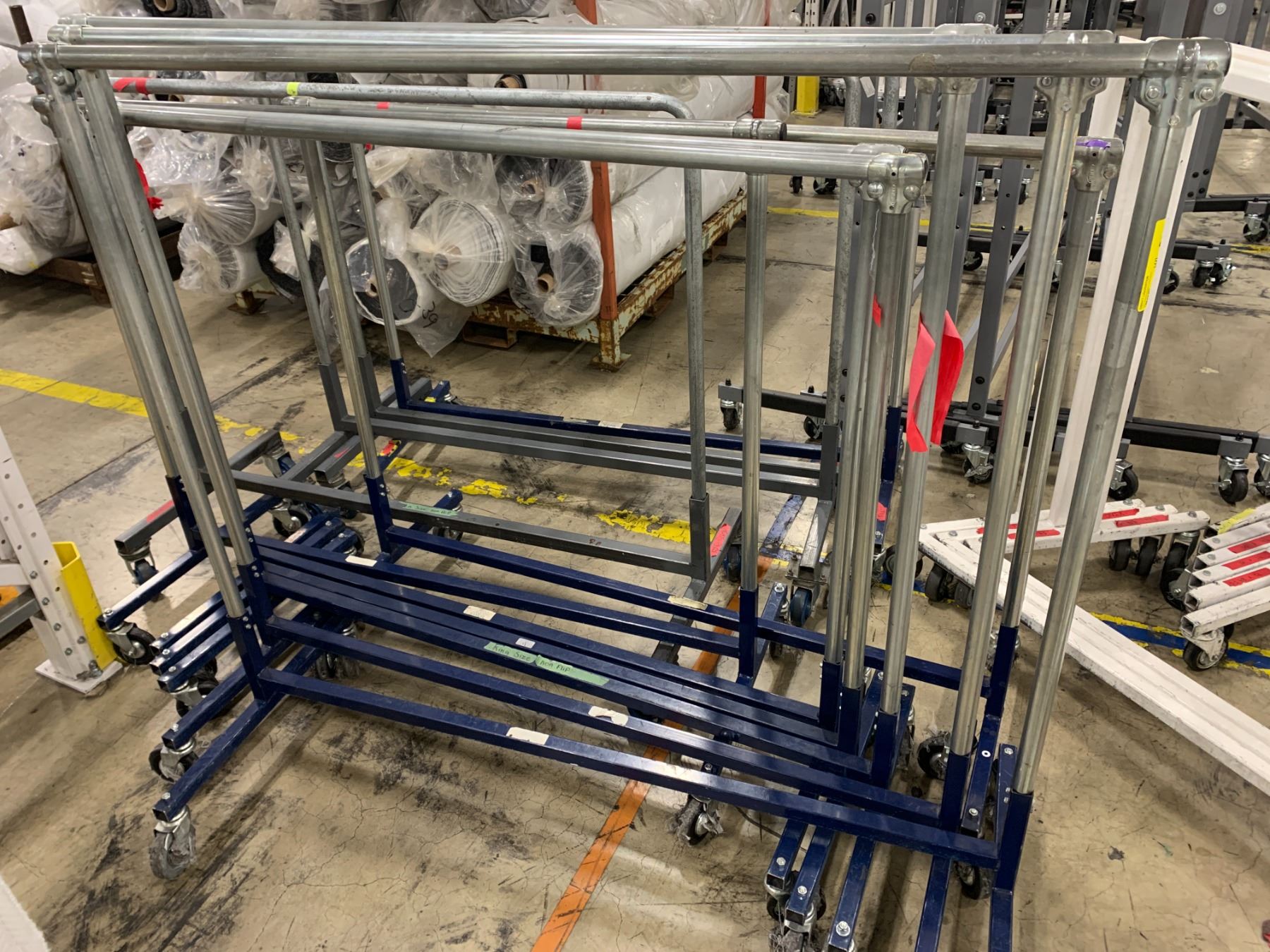 Large group of rolling racks - approx. 14 pcs