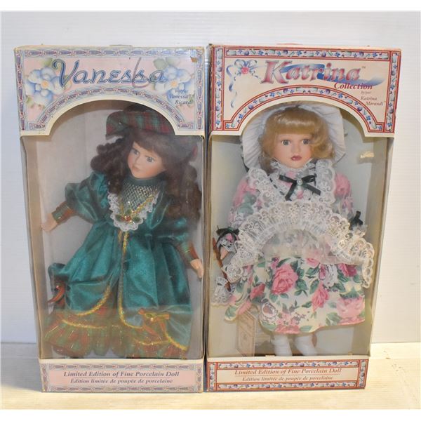 PAIR OF PORCELAIN DOLLS IN THEIR ORIGINAL BOXES