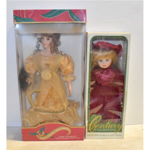 PAIR OF PORCELAIN DOLLS IN THEIR ORIGINAL BOXES