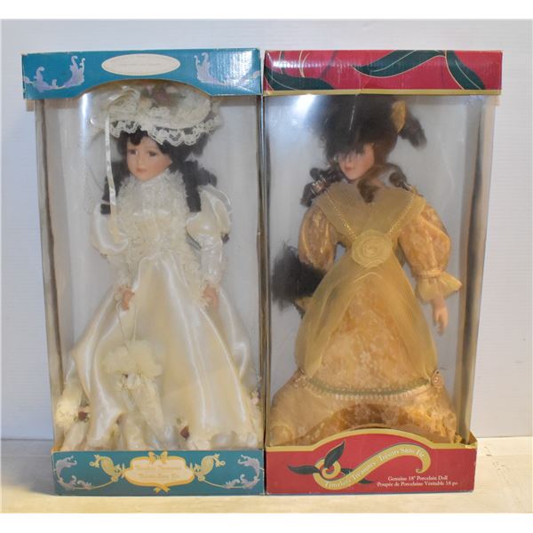 PAIR OF PORCELAIN DOLLS IN THEIR ORIGINAL BOXES