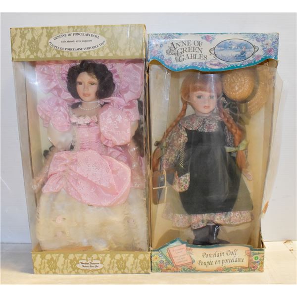 PAIR OF PORCELAIN DOLLS IN THEIR ORIGINAL BOXES