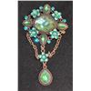 Image 1 : VINTAGE BROOCH WITH EMERALD AND AQUAMARINE STONES