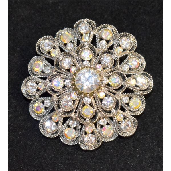 VINTAGE STARBURST BROOCH WITH IRIDESCENT STONES