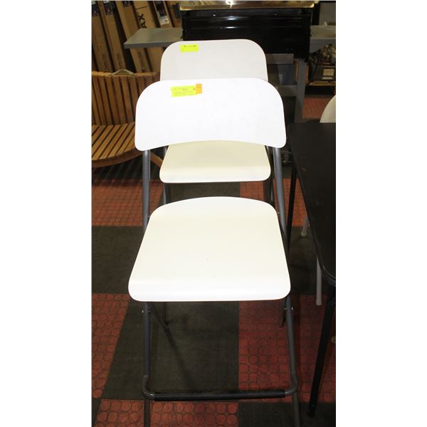 PAIR OF BAR HEIGHT WHITE FOLDING CHAIRS