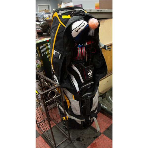 OGIO TRAVEL BAG WITH TAYLORMADE GOLF BAG & ODYSSEY