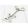 Image 1 : Louis Vuitton Silver-tone Metal Initiales Facettes Keyholder