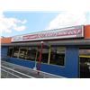 Image 1 : 2-Tampa Grand Prix Sign - 3' x 20' - 2 X $