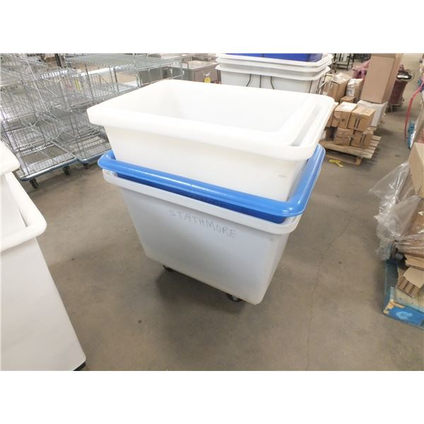4 Medium Sized Plastic Tubs On Wheels