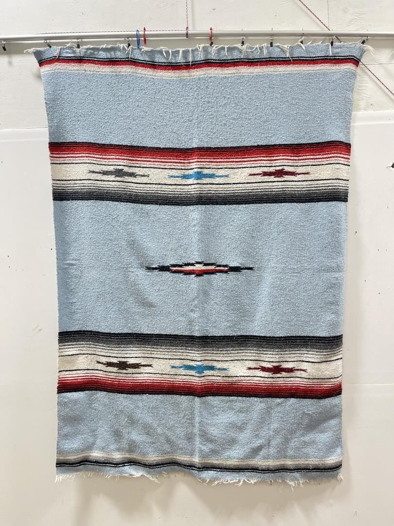 6249: 32 x 64 Acrylic top southwest design saddle blanket sold in a 6249: 32 x 64 Acrylic top southwest design saddle blanket sold in a