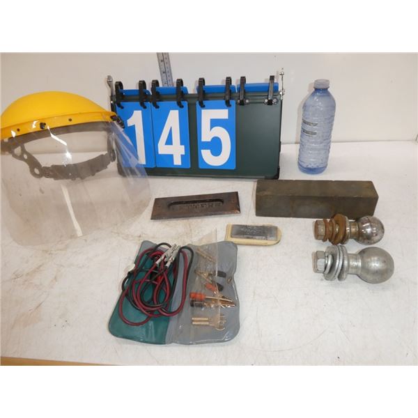 face shield, ball hitches, mini jumper cables
