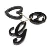 Image 2 : Gucci Black Plastic GG Heart Bag Charm