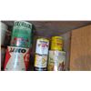 Image 2 : (shelf) full of paints, stains, some full