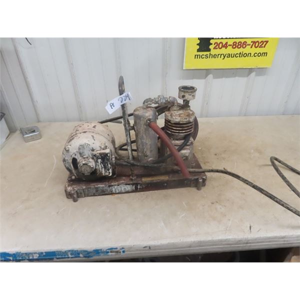 Old School Air Compressor Plugged in Working