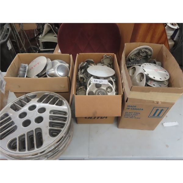 4 Boxes of Miscellaneous & Center Caps