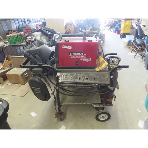 Lincoln Mig Welder Model Migpak 140, on Cart with Tank * tank might be owned or rented??*