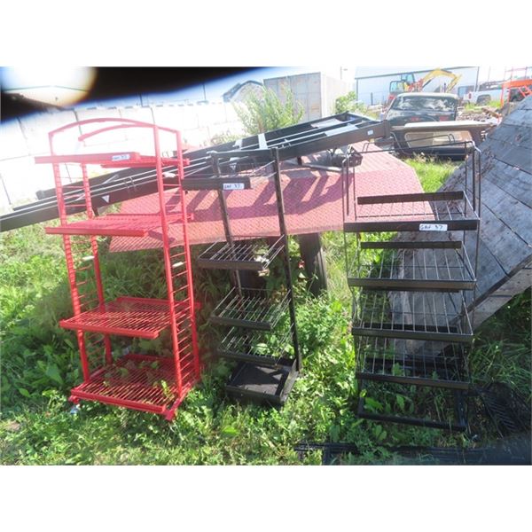 3 Metal Store Shelving Units - red one missing 2 castors