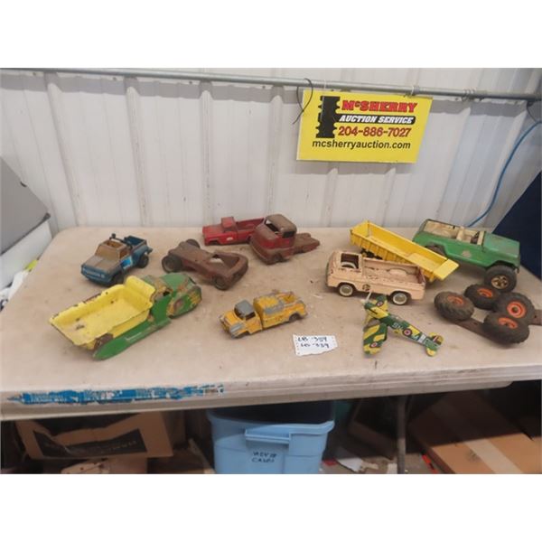 Old Metal  Toys - some rough - some rougher - including Early Lincoln Dump Truck