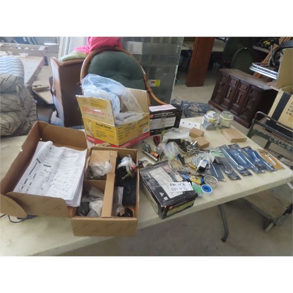 2 Boxes Flooring Staples, Baldwin Door Handles, 2/3 Box of Drywall Screws, Various Hardwares ,  Wall