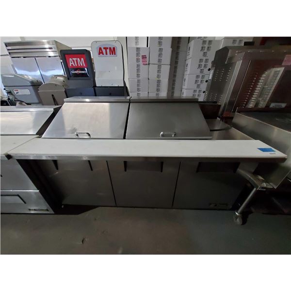 True Model TSSU-72 - 6 ft Triple Door Stainless Steel Refrigerated OPrep Table on wheels