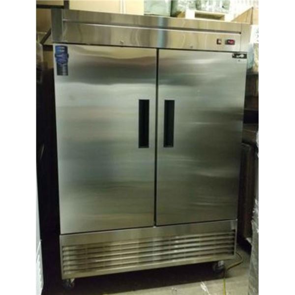 NEW stainless Steel 55 inch double door reach in Freezer. Unpacked but never used, with manuals