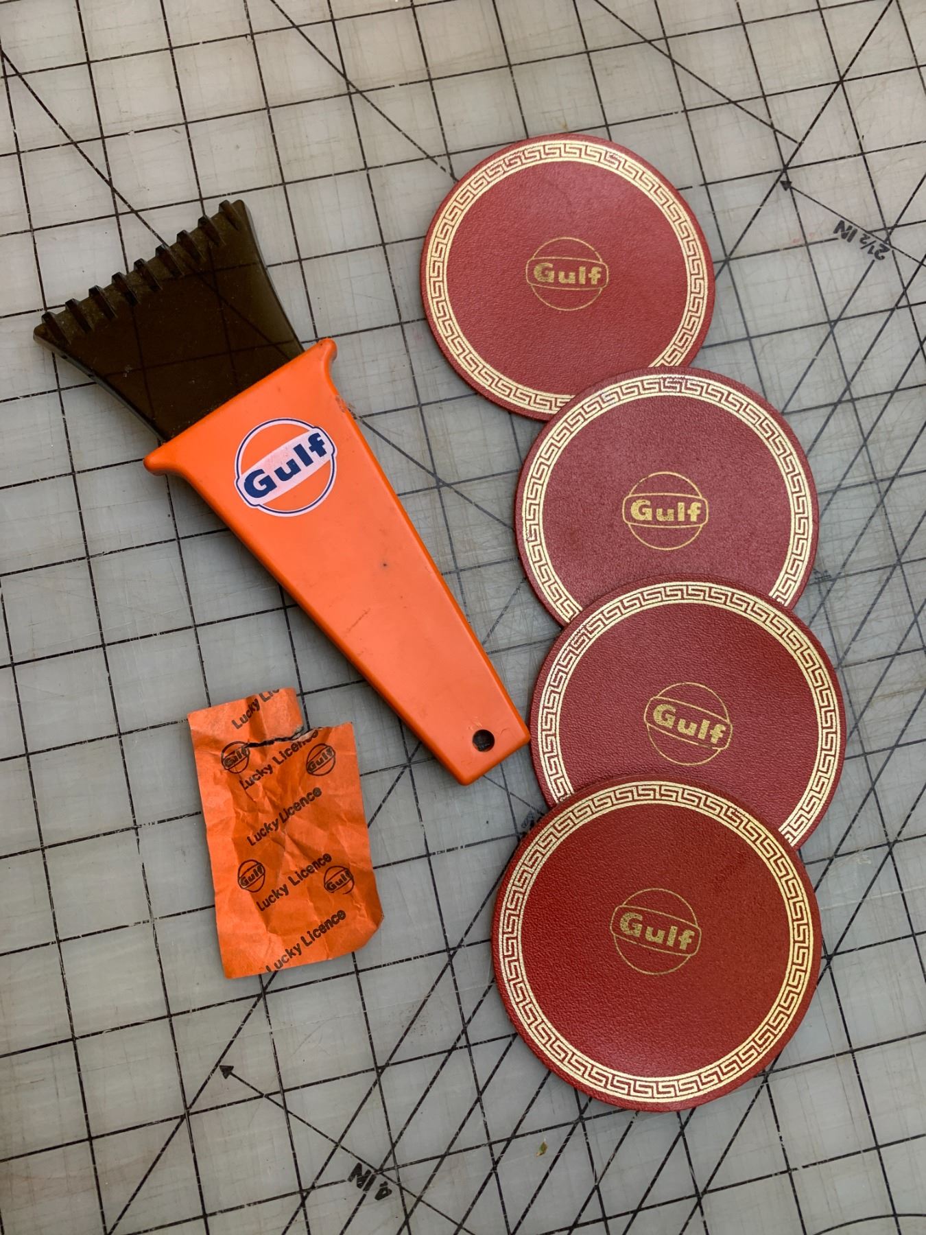 Wrapper Scripper VINTAGE GULF OIL ADVERTISING PIECES LEATHER COASTERS ICE SCRAPER ...