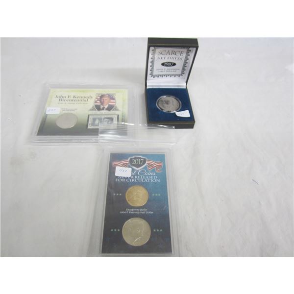 3 Kennedy Half Dollars and a Sacagawea Dollar