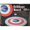 Image 2 : Curling Rocks, glow in the dark cribbage board.