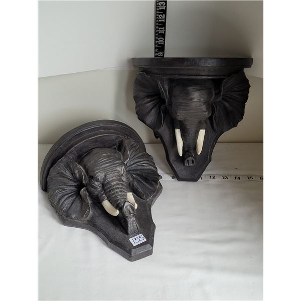 2 elephant head wall shelves.