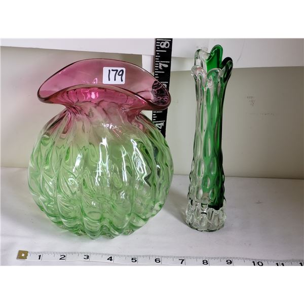 Coloured glass flower vases.