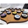 Image 2 : Rare Set of 22 NHL Hockey Pucks, "Texaco" Promo on Original Oak Board