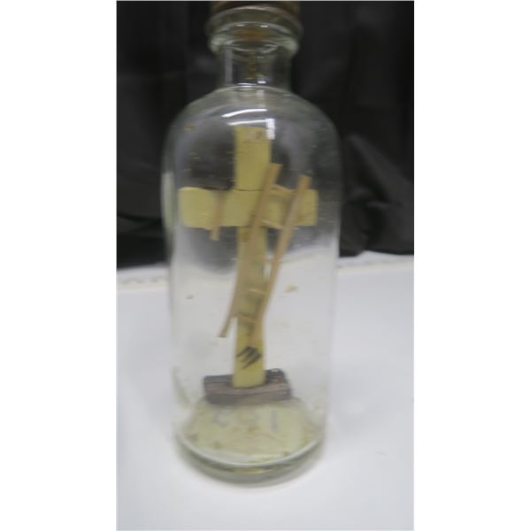 Religeous cross in a bottle