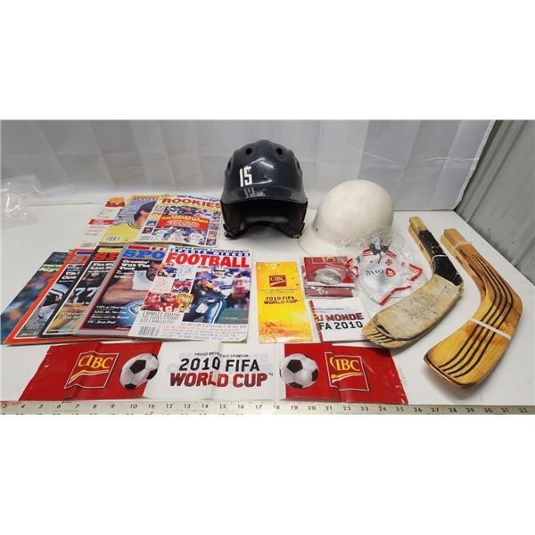 Huge lot of Sports Magazines, Memorabilia, Hockey sticks and assorted helmets/hardhat